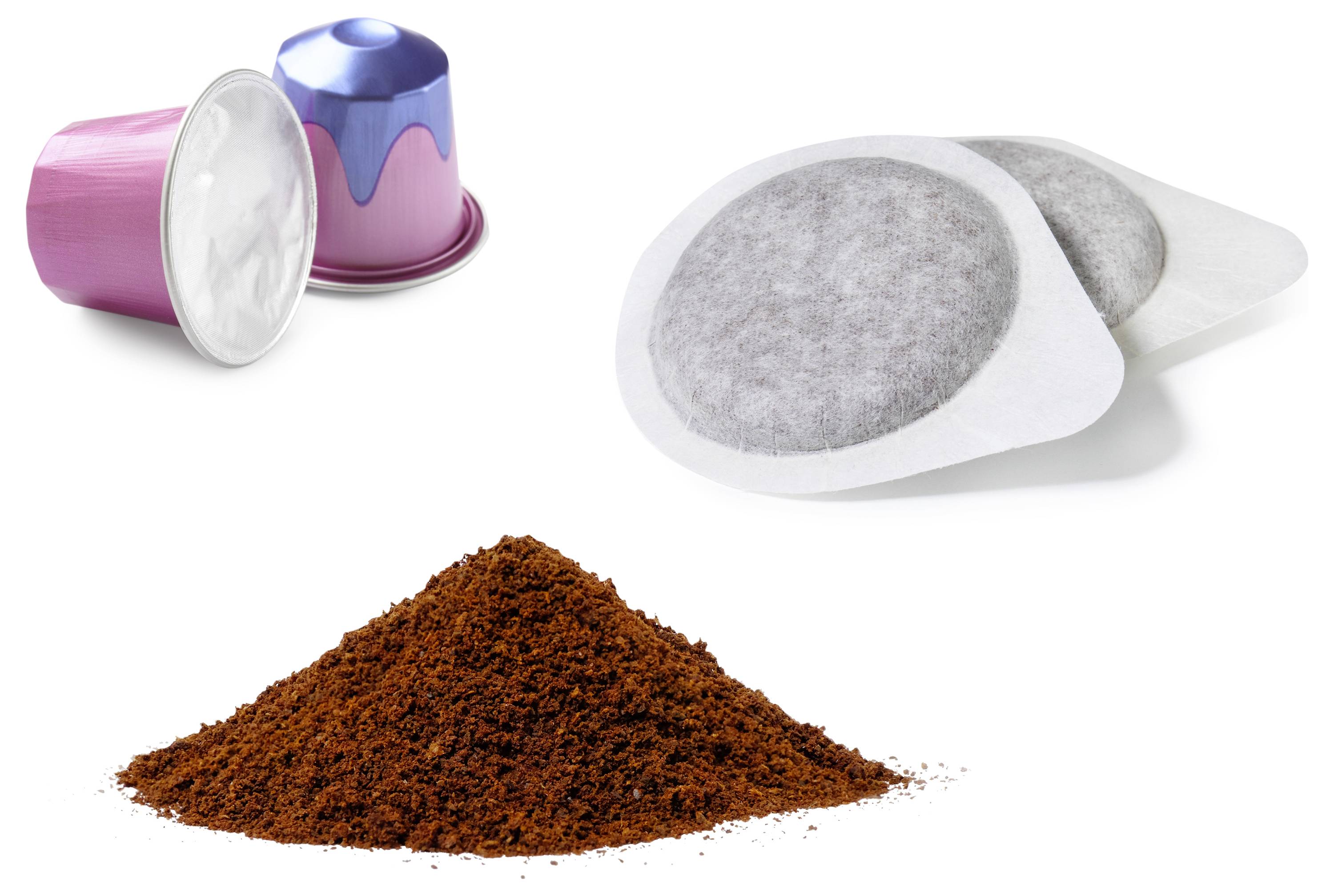 Coffee preparation options: two coffee pods, two round coffee filters, and a pile of ground coffee on a white background.