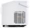 A white portable ice maker shown from the side, featuring ventilation slats and a handle.