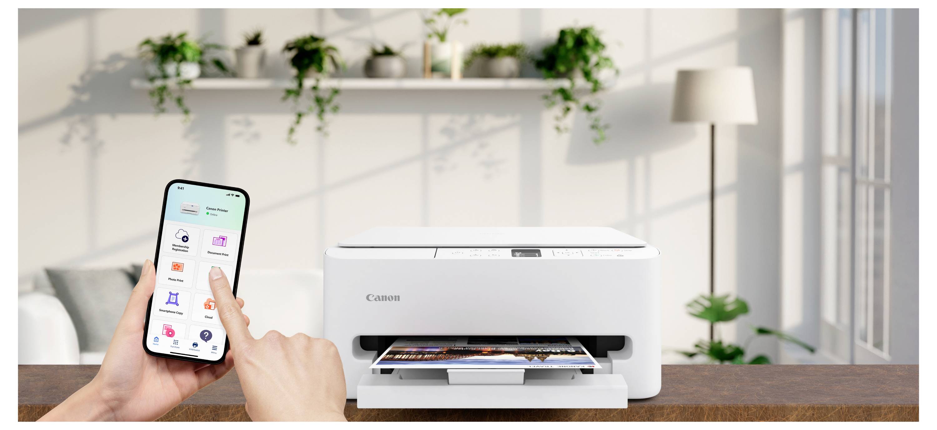 A person uses a smartphone app to wirelessly print a photo on a white printer in a bright, plant-decorated home office.