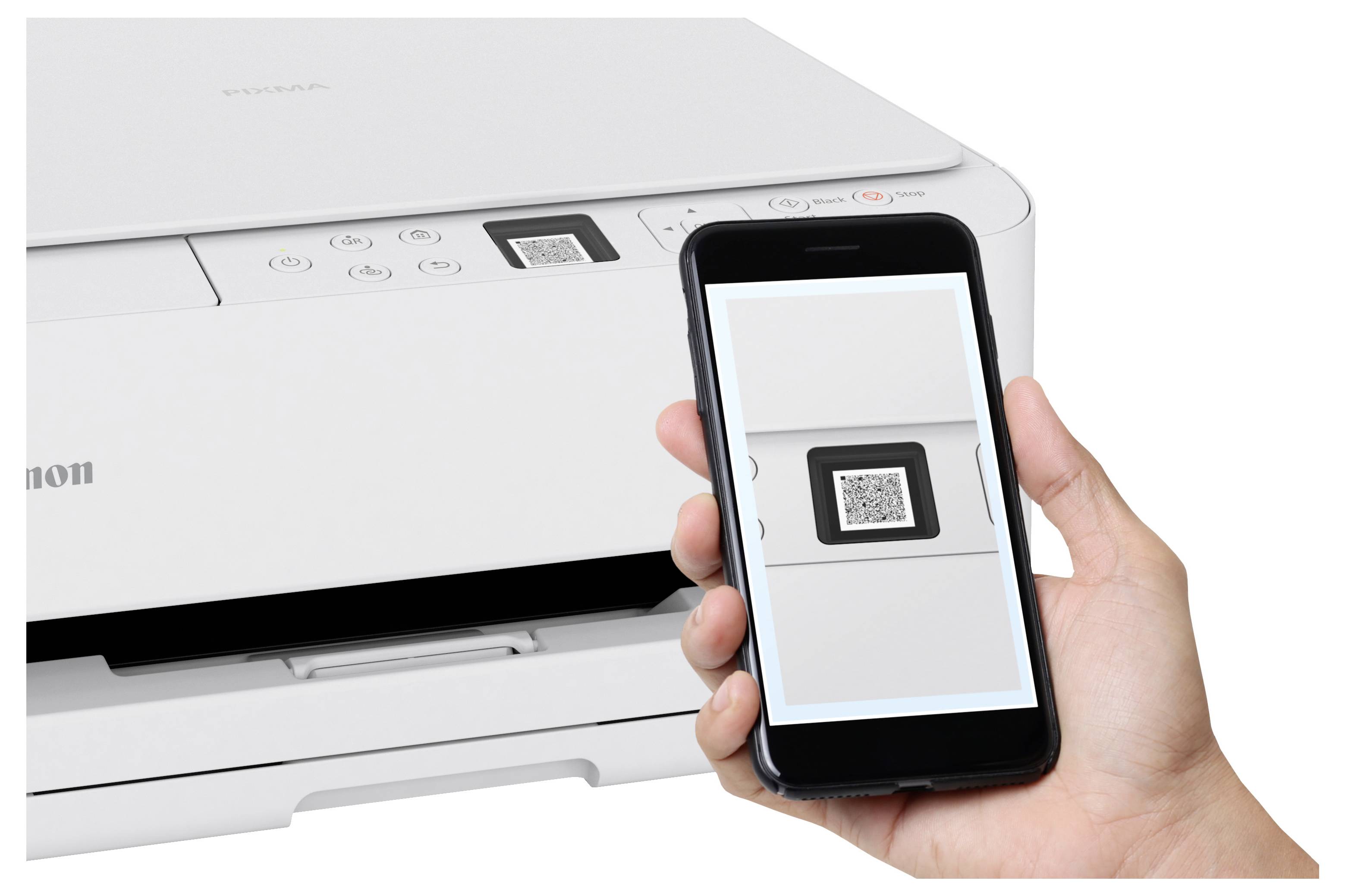 A person holds a smartphone scanning a QR code on a printer, likely illustrating instructions for connecting or setting up the device.