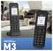 Two cordless phones, labeled 'FRITZ!Fon M3', are displayed. One phone is upright on a charging stand; the other lies flat. Display shows 'Claudia'.