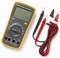 A digital multimeter with an orange border, displayed with red and black probes and various adapter clips, used for electrical measurements.