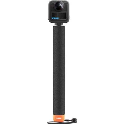 A compact action camera mounted on an extendable selfie stick with a textured grip handle, designed for versatile photography and videography.