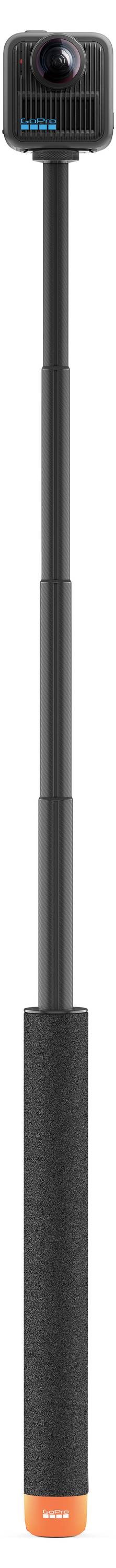 A black and orange telescopic stick with a camera mount at the top and a foam grip handle at the bottom, designed for use with cameras.