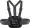 A black chest harness with adjustable straps designed to hold an action camera securely in place for hands-free filming during activities.