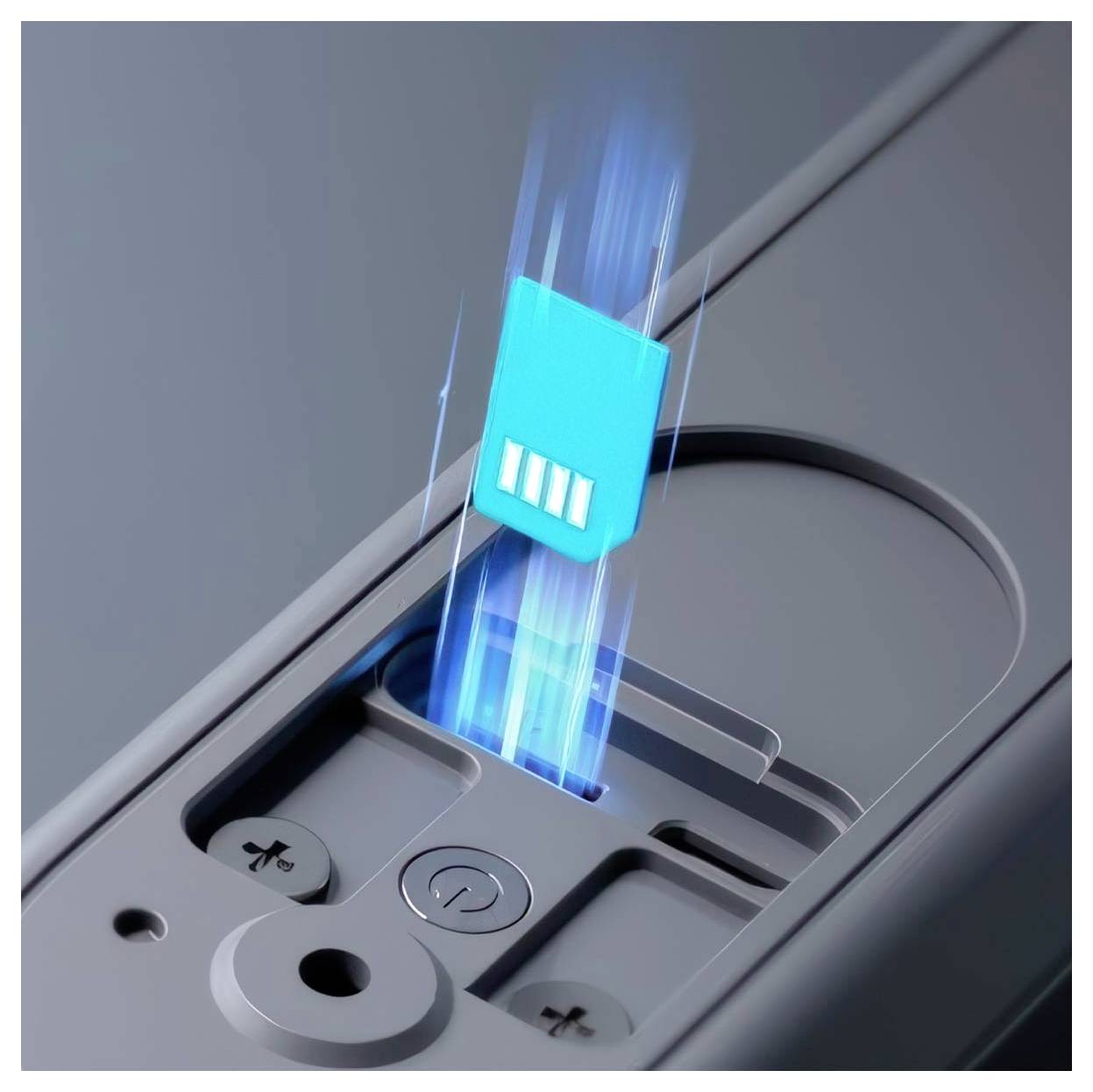 A close-up of a memory card being inserted into an electronic device's slot, illustrating installation or data transfer process.