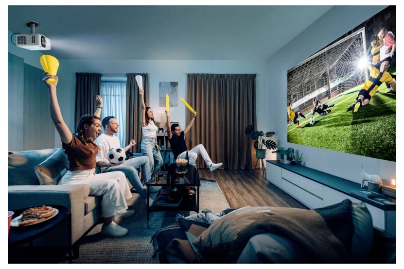 People watching a soccer match on a projector screen at home, cheering and holding soccer-themed items, conveying excitement and engagement.
