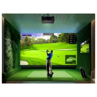 A person swings a golf club in an indoor golf simulator room. The large screen displays a vibrant golf course. Golf clubs are on the side.
