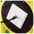 A black cable is plugged into a white socket on a yellow structure with a black circular base, possibly for power or data transfer.