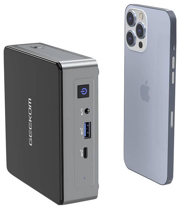 Geekomi external battery/charger beside the back of a smartphone, showing power button, USB-A and USB-C ports<br>
