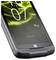 A rugged smartphone with a black and gray design, featuring a glowing green and yellow abstract pattern on the screen displaying '10:07' and 'CORE-M6'.