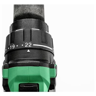 A close-up of a black and green drill head with a numeric adjustable ring, featuring marked numbers 19 and 22, highlighting precision.