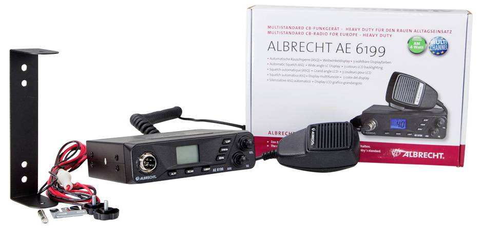 'Albrecht AE 6199' CB radio and accessories, including a microphone, power cables, mounting bracket, and original packaging.