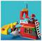 Children's building block set featuring a colorful pirate-themed structure with a slide, ladder, shark, flags, and toy figures.