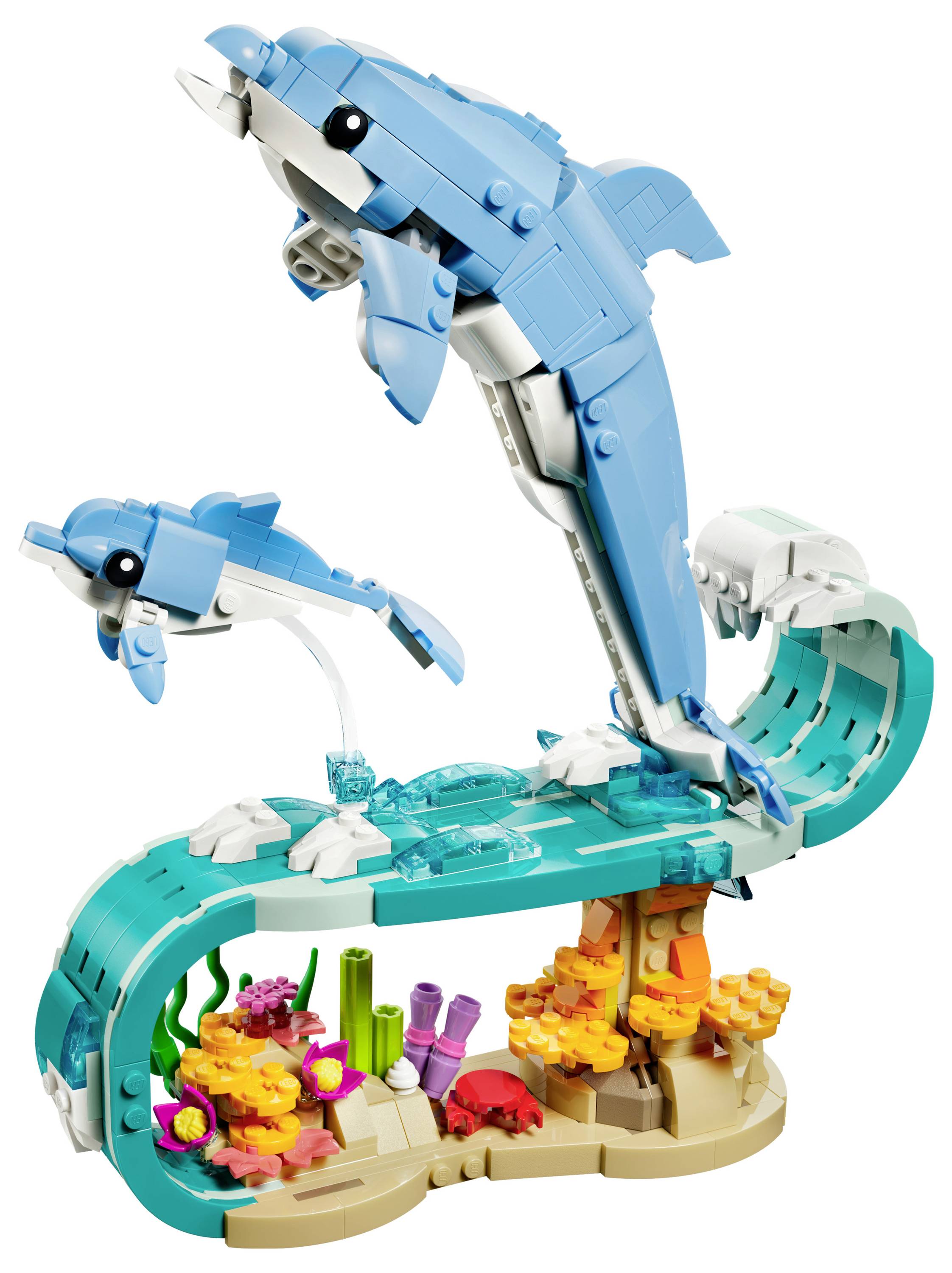 Two dolphins made of building blocks leap above colorful coral and sea plants, creating a lively ocean scene.