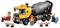 A toy construction scene with a cement mixer truck, three worker figures, barriers, and a motorcycle, depicting a playful construction setting.