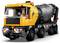 A toy cement mixer truck with bright yellow and gray colors. It features six wheels, side mirrors, and a small figure in the driver's seat.