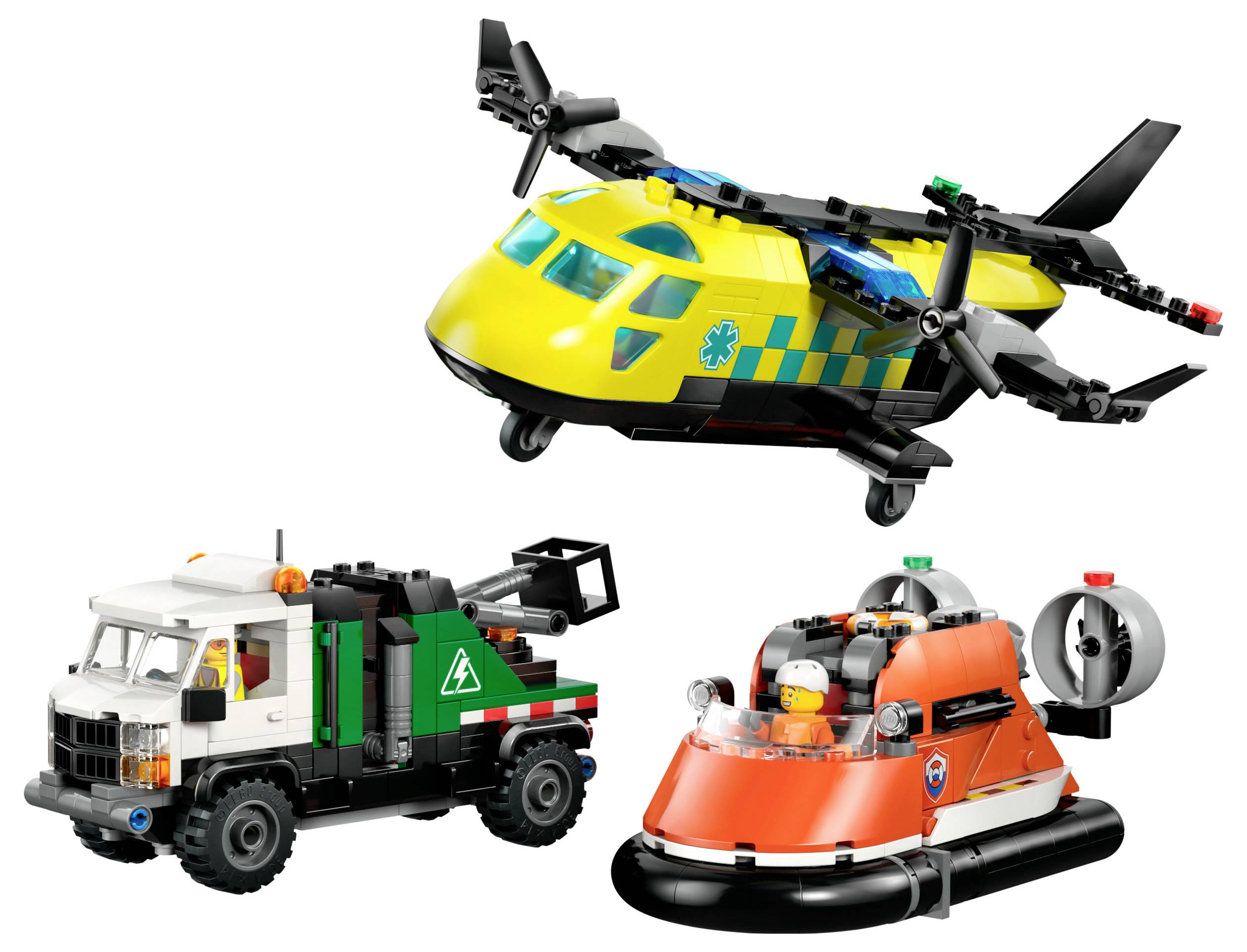 A collection of three toy vehicles: a yellow and black helicopter, a green and white tow truck, and an orange hovercraft with a figure.