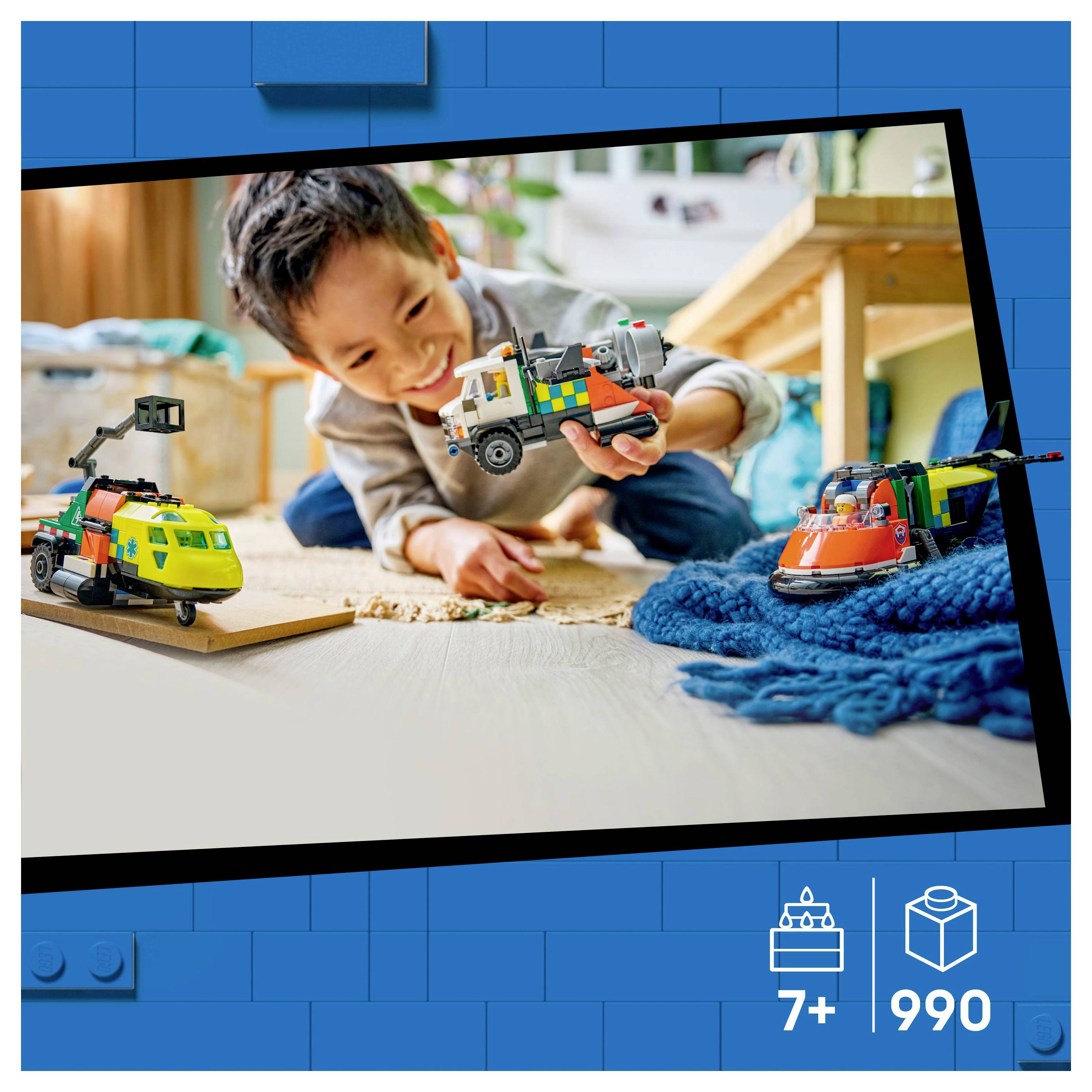 A child enthusiastically plays with colorful toy vehicles on the floor, suggesting creative and imaginative play, suitable for ages 7 and up.