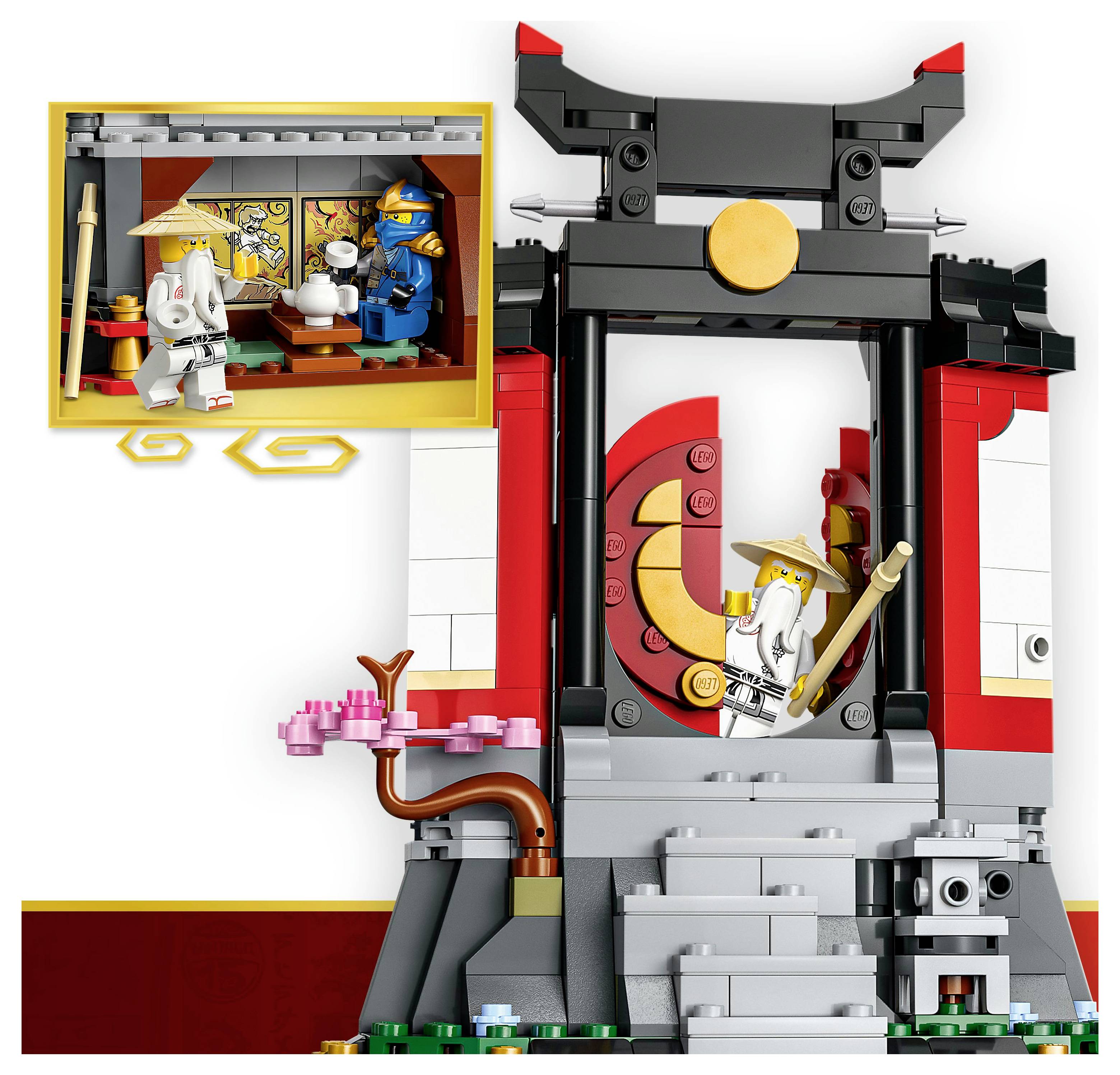 'A LEGO scene depicts a dojo with two minifigures—one in a white robe holding a staff, another in blue armor inside a smaller inset room.'