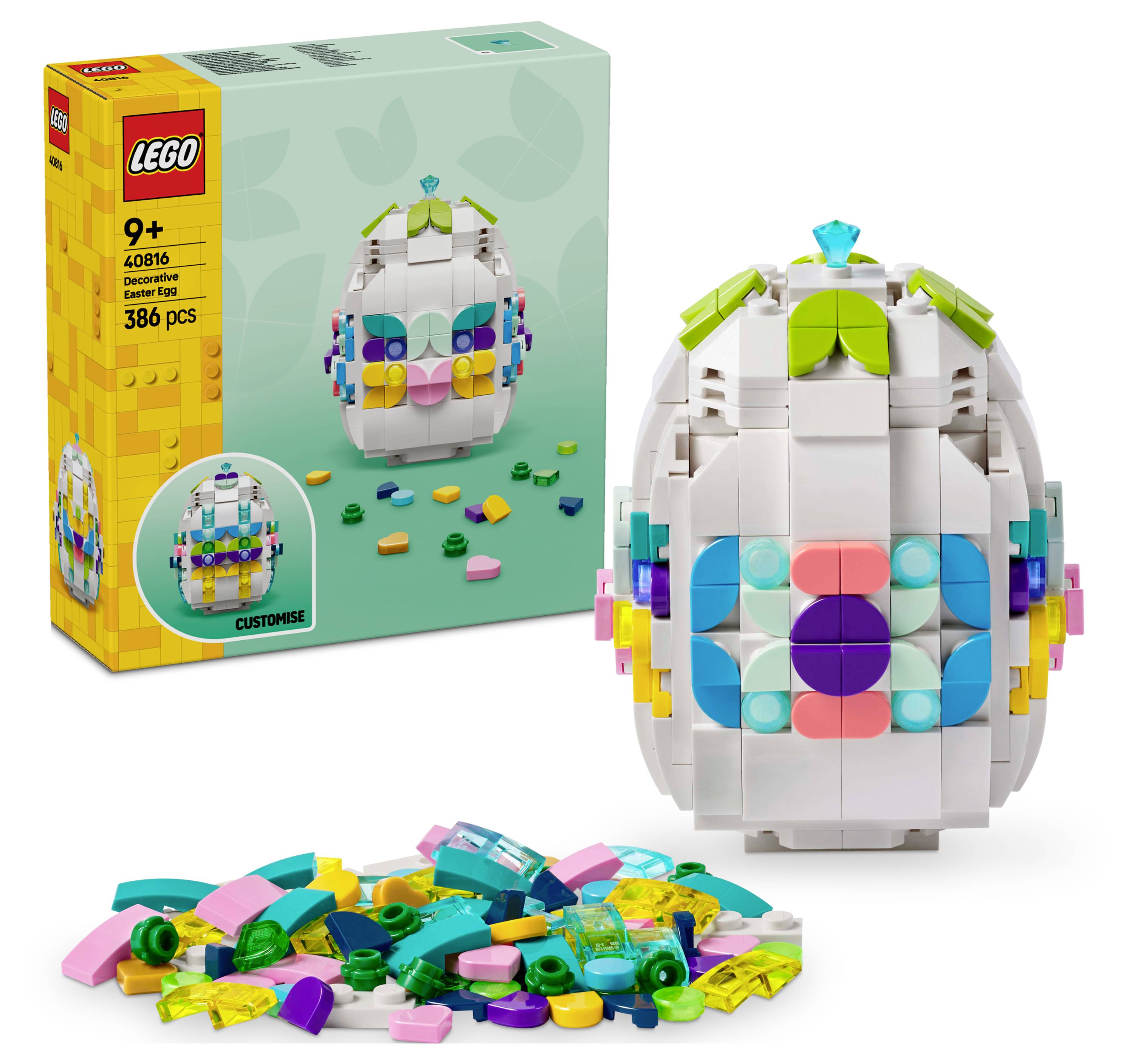 A colorful customized egg-shaped LEGO model with various colored pieces in the foreground, alongside its box indicating it is for ages 9+.