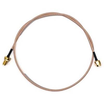 A coaxial cable with gold-plated connectors on each end, coiled in a circle.
