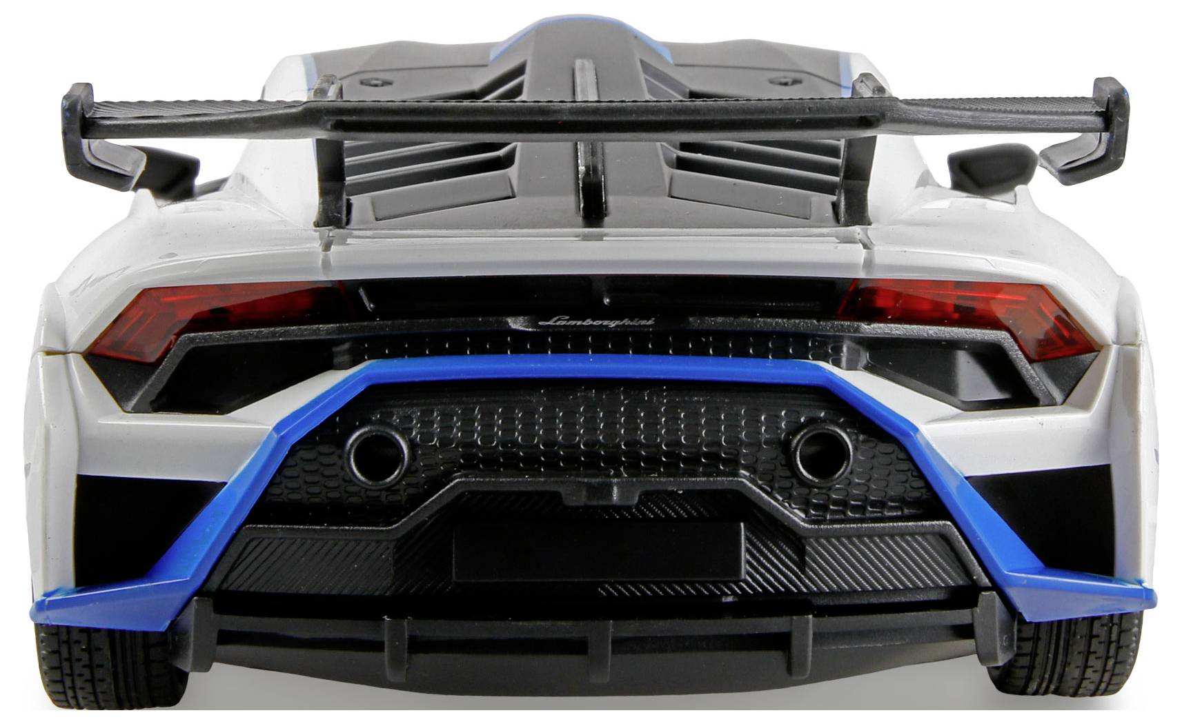 A sleek sports car viewed from the rear, showcasing a large spoiler, dual exhausts, and red taillights, emphasizing speed and aerodynamics.