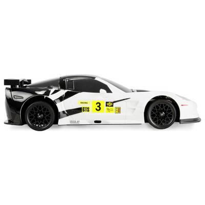 A white and black toy racing car with number '3' on the side, features a spoiler and decorative racing decals.