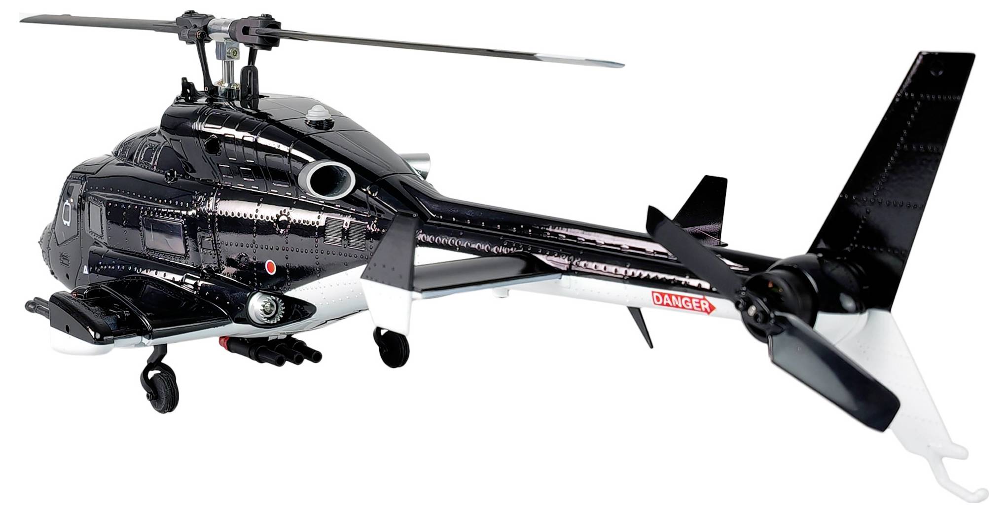 A black helicopter model with sleek design and small 'Danger' sign on tail. Features detailed rotor blades and landing gear.
