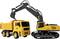 'Yellow excavator loading a yellow dump truck. Both vehicles are side by side, with the excavator's arm extended over the truck.'