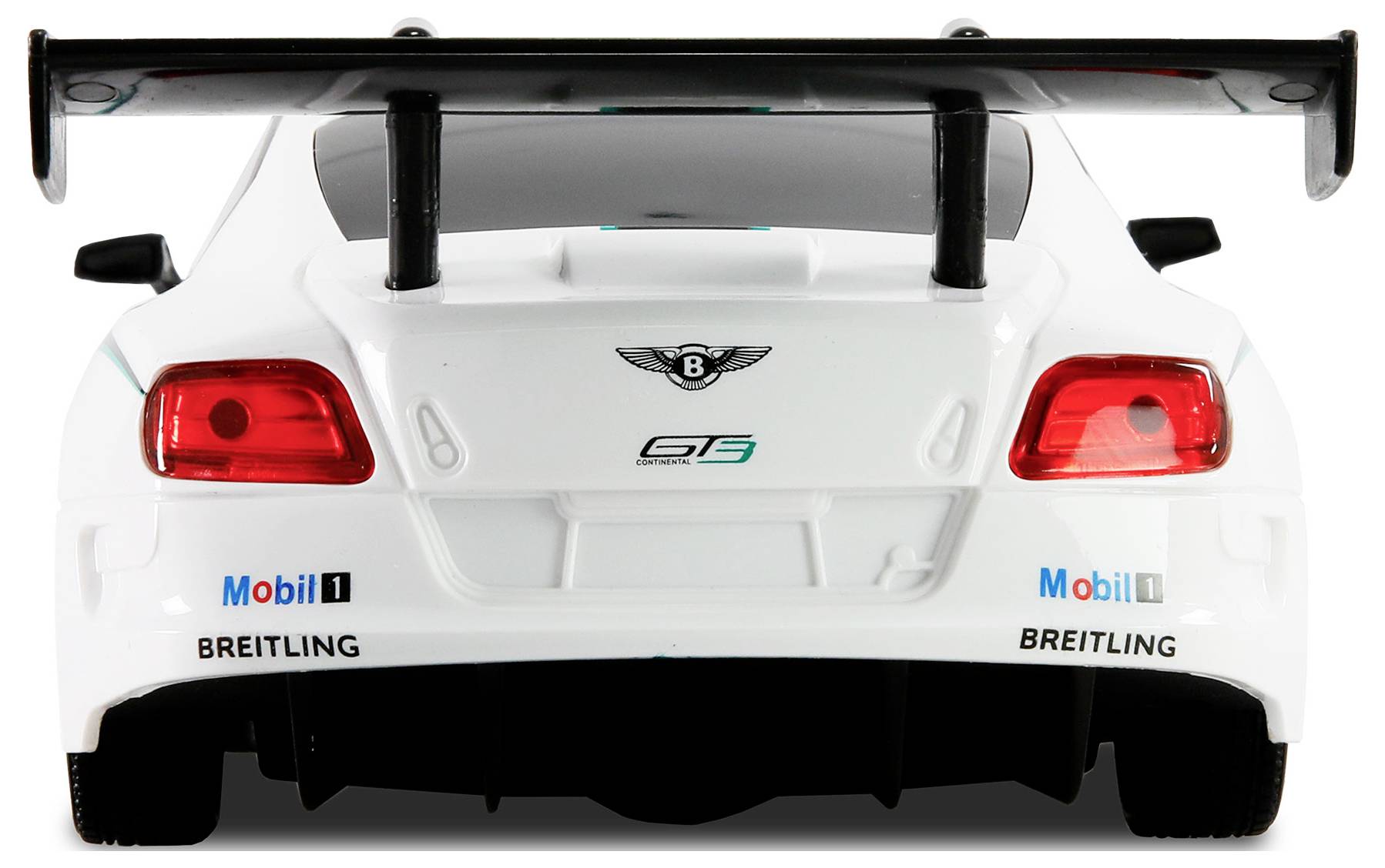A white race car displaying branding from 'Mobil 1' and 'Breitling', with a prominent rear spoiler and visible logos, viewed from the back.