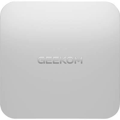 A white square container with the brand name 'GEEKOM' embossed in the center, possibly a product packaging or device casing.