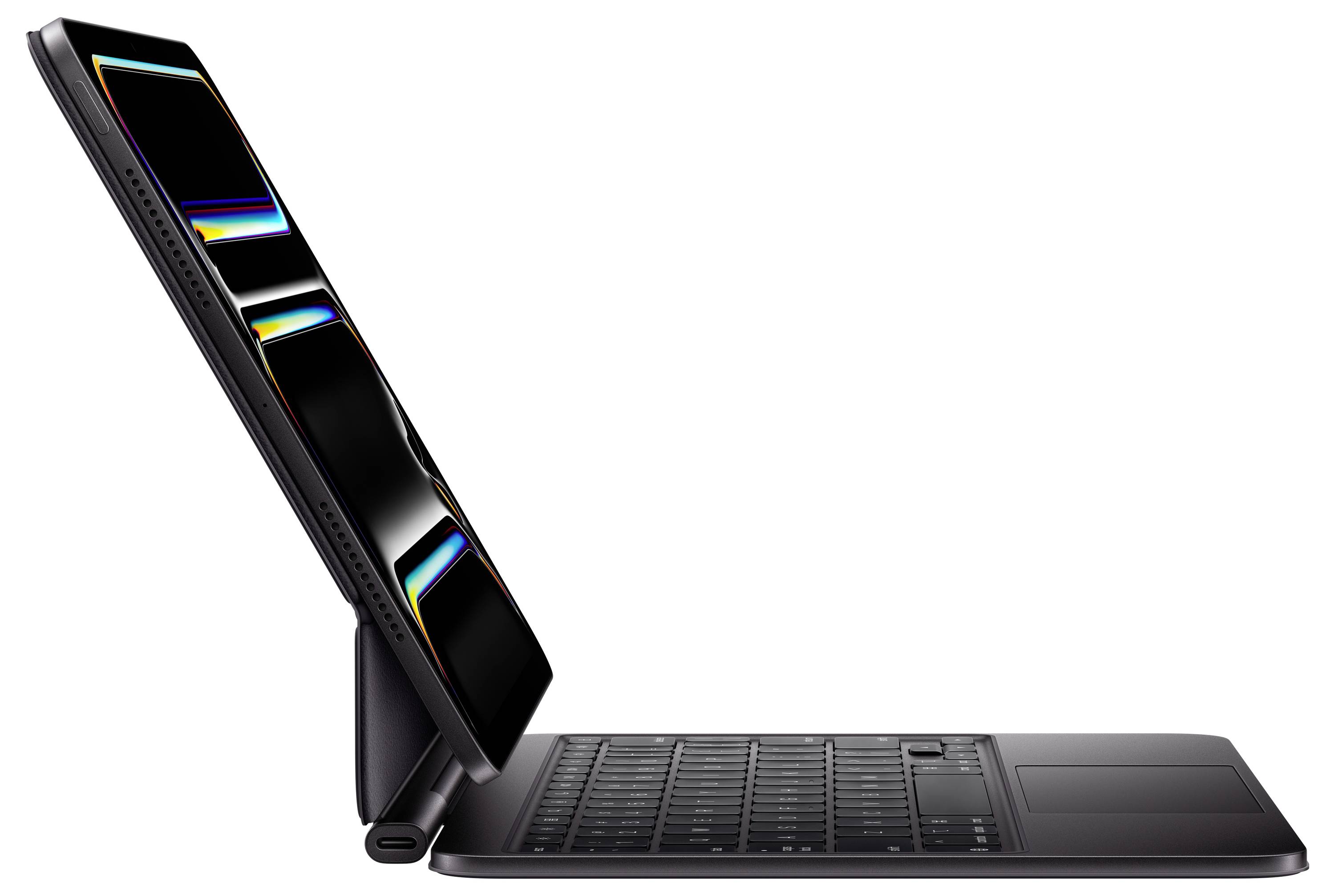 A side view of a tablet docked on a keyboard stand, displaying colorful reflections on its screen, with a USB-C port visible.