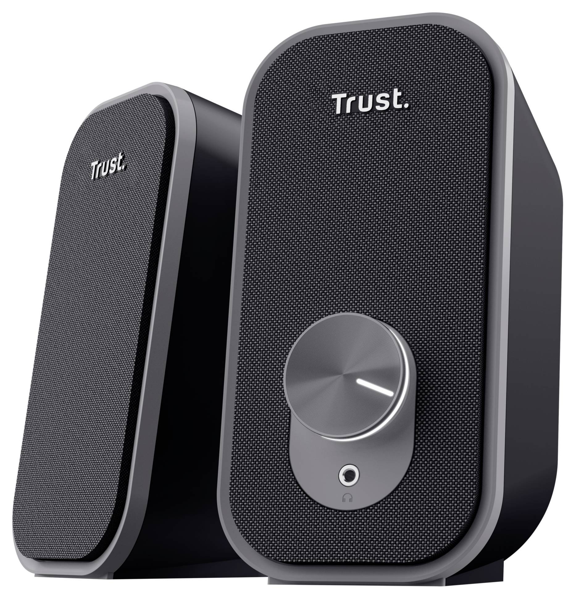 'Trust' brand speakers set with black mesh fronts, rounded edges, and a silver volume knob on the front of the right speaker.