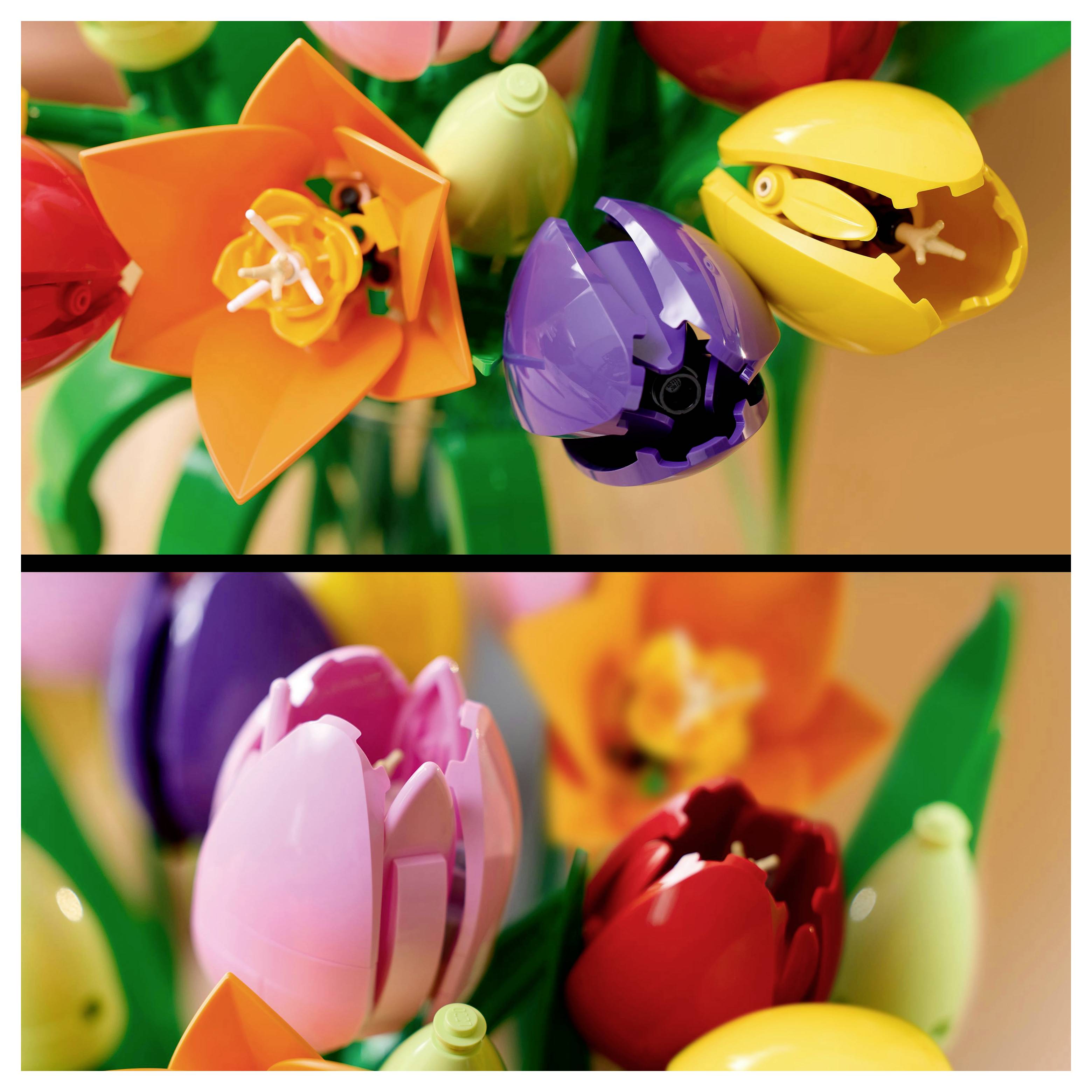 Lego flowers in vibrant colors, including orange, purple, pink, and red, arranged in a bouquet.