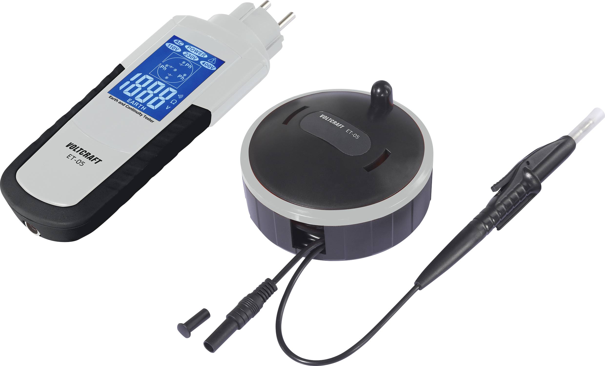 A handheld moisture meter with probe and a round remote sensor puck connected by cables, shown as a measurement kit.<br>