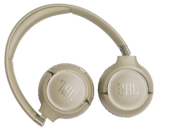 Beige JBL headphones folded flat for storage, showing JBL logo on ear cups.
