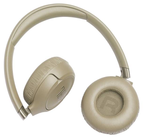 Beige over-ear headphones positioned sideways, showing an 'R' on the right ear cushion.