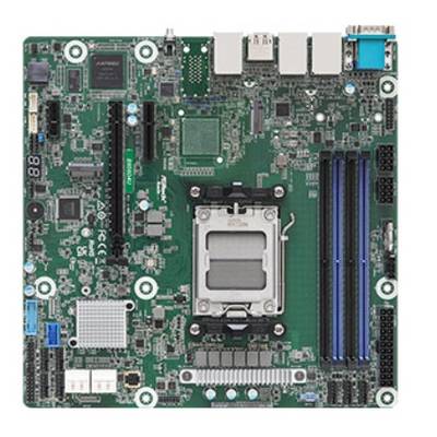 A green computer motherboard with various components including a CPU socket in the center, RAM slots on the right, and multiple ports.