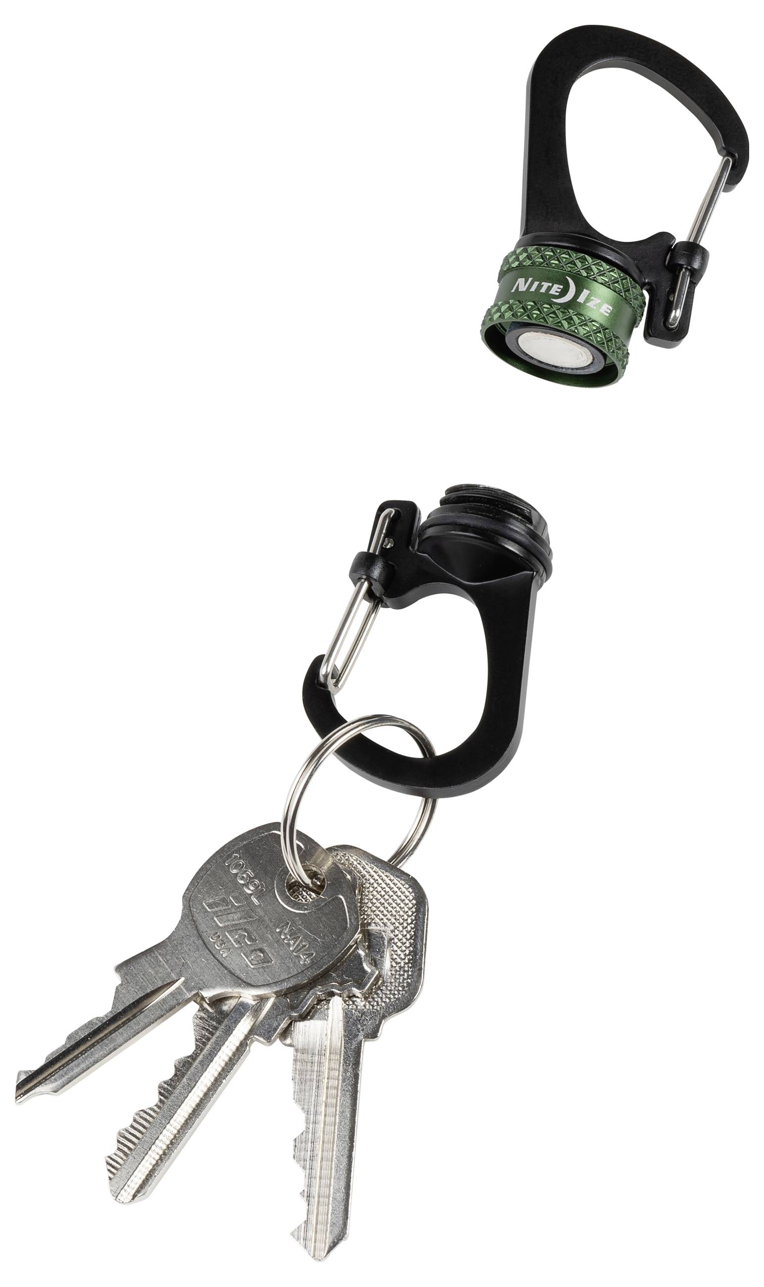 A small black carabiner with a green bottle cap design holds a set of silver keys, showcasing a functional and stylish keychain accessory.