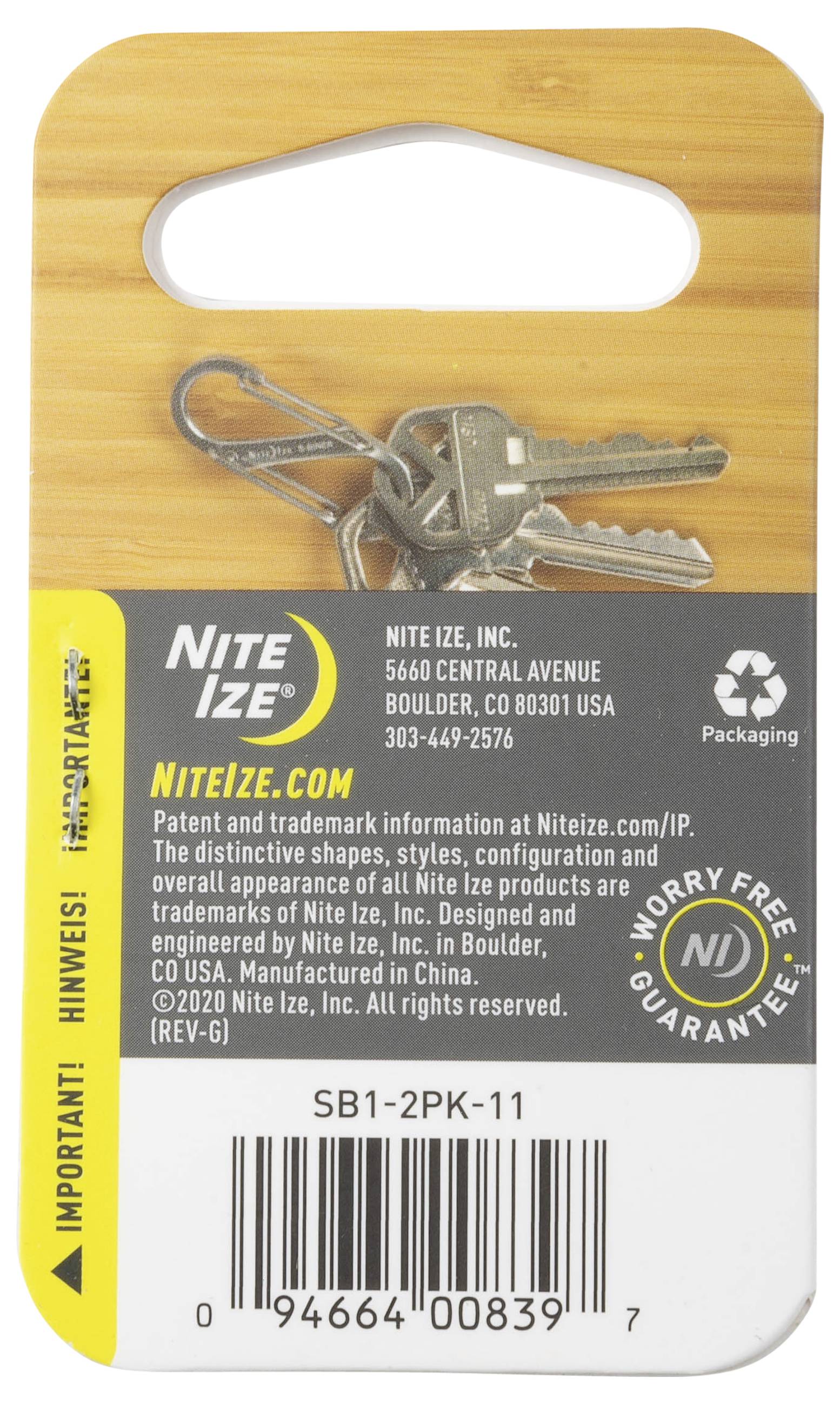 Keys attached to a steel ring against a white background, with branding and contact details for Nite Ize, including address and phone number.