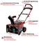 Electric snow blower in red and black with adjustable speed, metal roller, foldable handlebar and adjustable chute. Battery cover protects against snow and moisture.