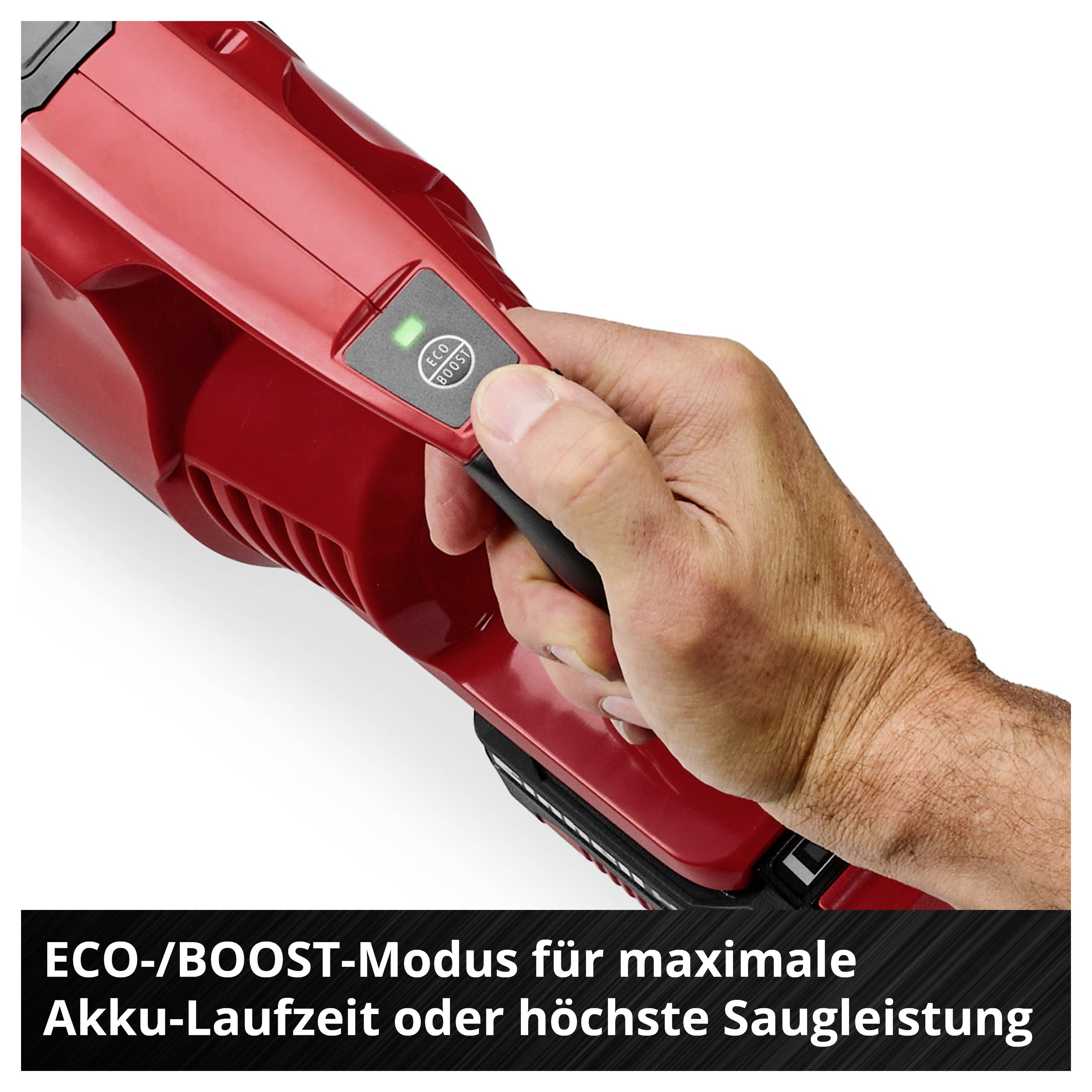 Close-up of a hand pressing the ECO/BOOST button on a red device. Text: 'ECO/BOOST mode for maximum battery life or highest suction power'.