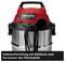 Industrial vacuum cleaner with a red top, black handle and stainless steel container. Text: 'Cable winding on the housing for storing the power cable'.
