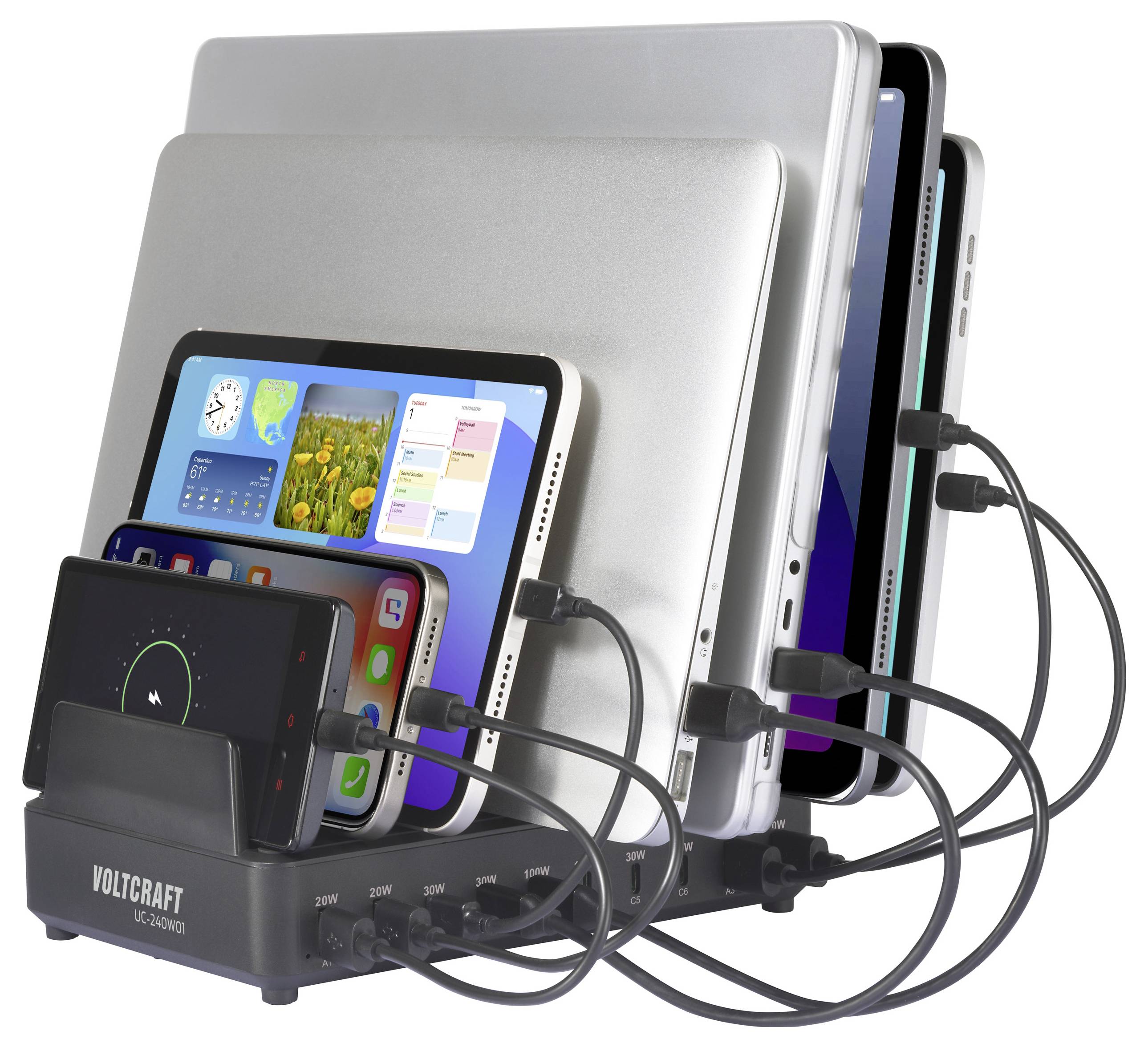 'Voltcraft UC-10ACQ' charging station with multiple devices: laptops, tablets, and a smartphone, all connected for charging.