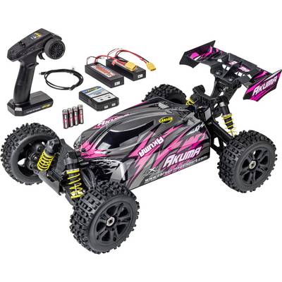 Remote-controlled car with a black and pink design labeled 'Akuma', shown with remote, batteries, charger, and cables for assembly.
