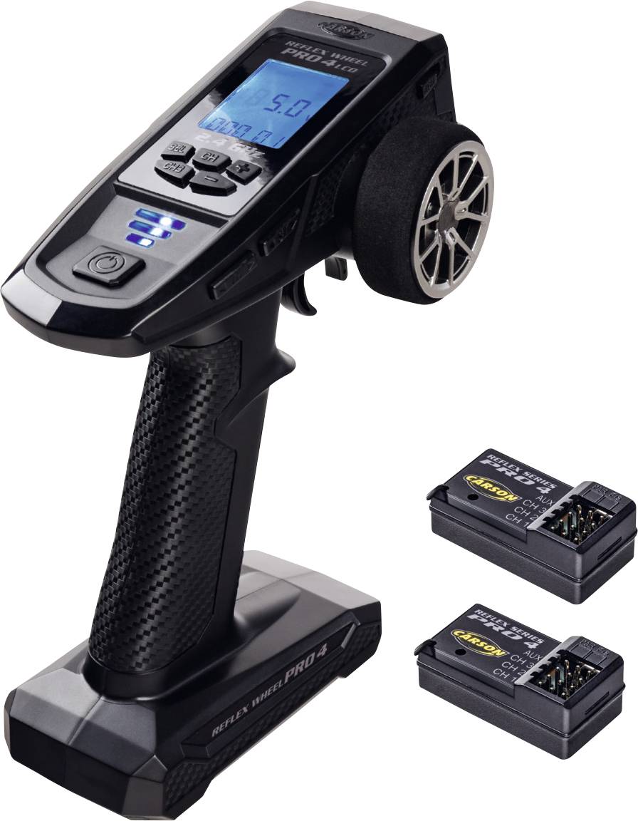 'Remote control device with a digital display, control buttons, and a steering wheel. Includes two battery packs.'