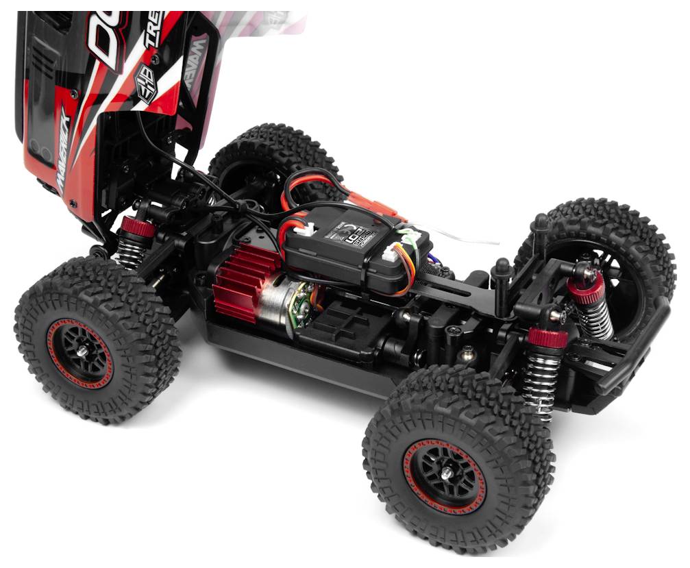 A remote-controlled car with an exposed chassis showing the engine, suspension, and wiring, emphasizing its mechanical details.