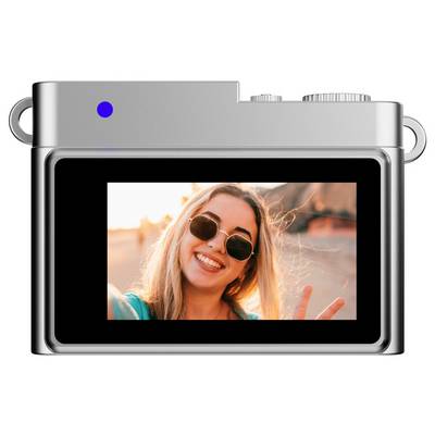 Rear view of a camera showing a screen displaying a smiling person wearing sunglasses and making a peace sign.