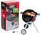 'Weber mini' toy grill set with box. Features a black grill on a stand with play food items like sausages and tongs included.